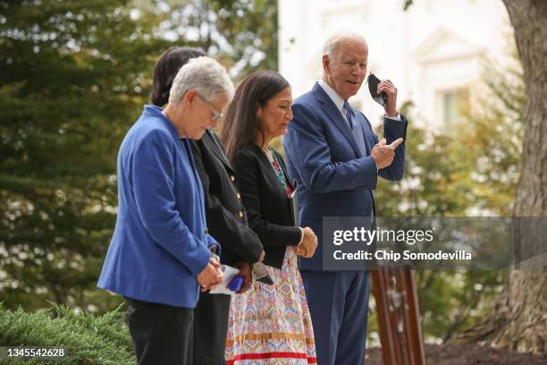 President Joe Biden stands with Gina McCarthy, Assistant to the President & National Climate Advisor, Brenda Mallory, Chair of the Council on...