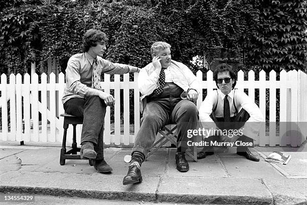 From left to right, British actors Paul McGann, Richard Griffiths and Richard E. Grant in London for a scene in the movie 'Withnail & I', 1986.