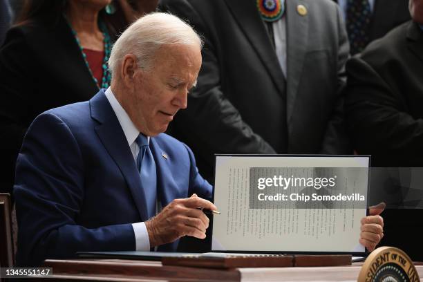 President Joe Biden signs proclamations expanding the areas of three national monuments at the White House on October 08, 2021 in Washington, DC....