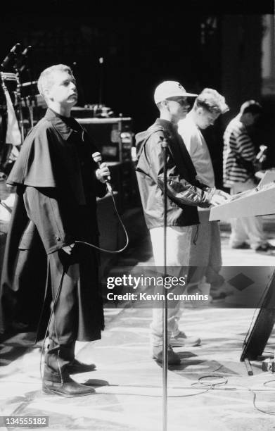 Neil Tennant and Chris Lowe, of the Pet Shop Boys, performing on stage with Bernard Sumner and Johnny Marr of Electronic, at the Dodgers Stadium, Los...