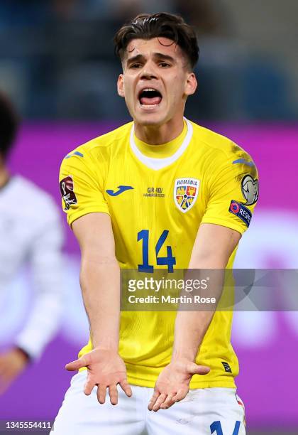 Ianis Hagi of Romania reacts during the 2022 FIFA World Cup Qualifier match between Germany and Romania at Imtech Arena on October 08, 2021 in...
