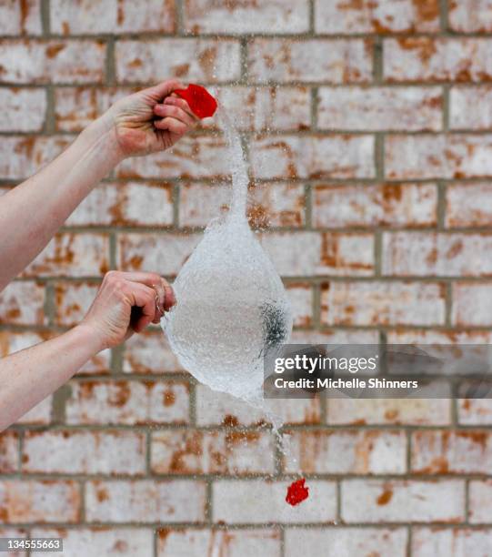 Poofing Exploding Exploding Brick Wall Photos and Premium High Res Pictures - Getty Images