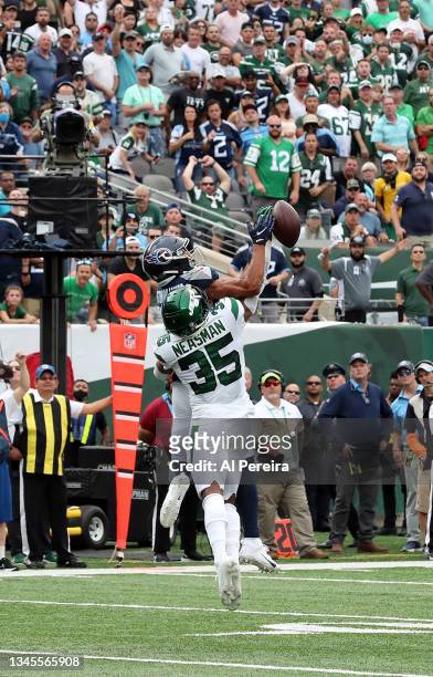 Safety Sharrod Neasman of the New York Jets breaks up a pass during the Tennessee Titans vs New York Jets game at MetLife Stadium on October 3, 2021...