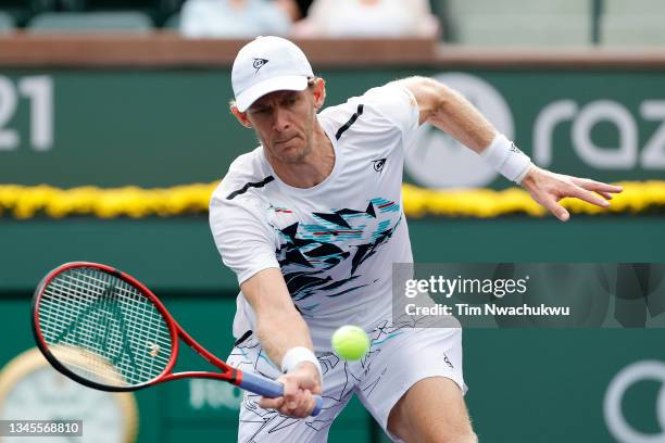Kevin Anderson of South Africa returns a shot to Jordan Thompson of Australia during the BNP Paribas Open at the Indian Wells Tennis Garden on...