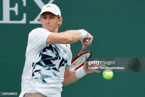 Kevin Anderson of South Africa returns a shot to Jordan Thompson of Australia during the BNP Paribas Open at the Indian Wells Tennis Garden on...