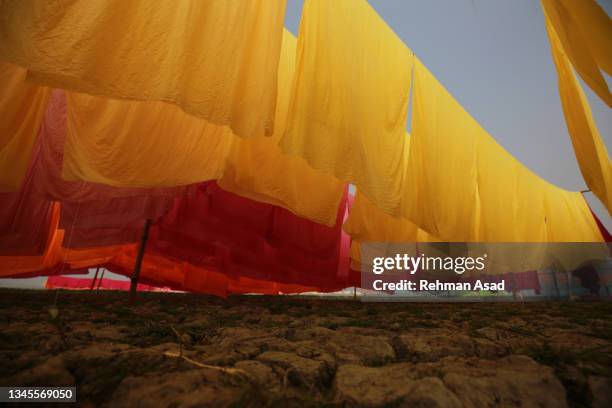 fabrics drying under the sun - textile industry stock pictures, royalty-free photos & images