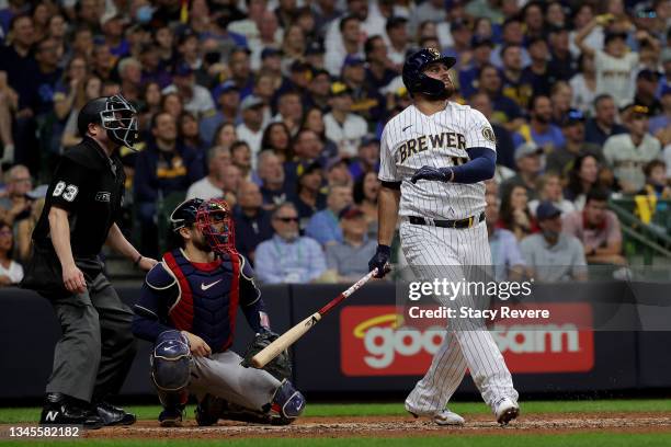 Rowdy Tellez of the Milwaukee Brewers hits a two run home run in the seventh inning during game 1 of the National League Division Series against the...