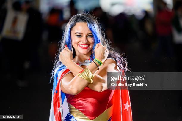 Cosplayer dressed as Wonder Woman from the DC Universe poses during the second day of Comic Con at Javits Center on October 08, 2021 in New York City.