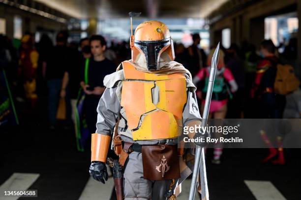 Cosplayer dressed as A Mandalorian from "Star Wars" poses during the second day of Comic Con at Javits Center on October 08, 2021 in New York City.