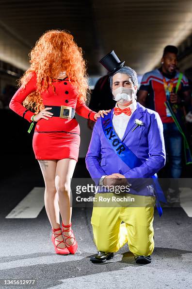 silhouette Ongoing hijack Cosplayers dressed as Sara Bellum and The Mayor of Townsville of "The...  News Photo - Getty Images
