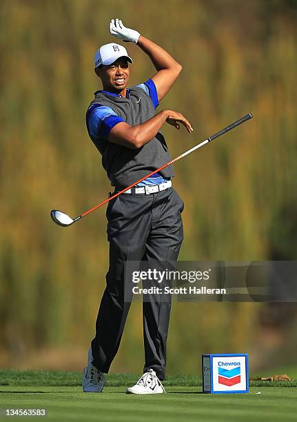 Tiger Woods watches his tee shot on the fifth hole during the second round of the Chevron World Challenge at Sherwood Country Club on December 2,...