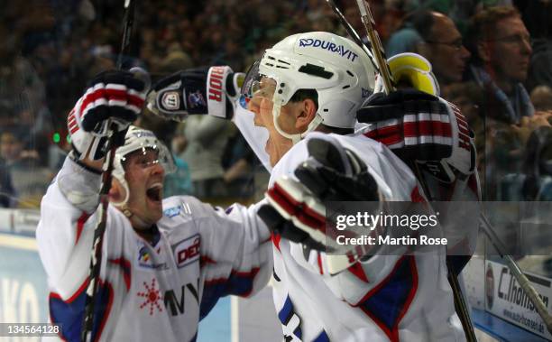 Frank Mauer of Mannheim celebrates after he scores his team's winning goal during over time during the DEL match between Hamburg Freezers and Adler...