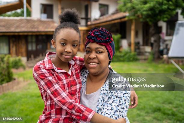 mother and daugher's portrait - jamaican culture stock pictures, royalty-free photos & images