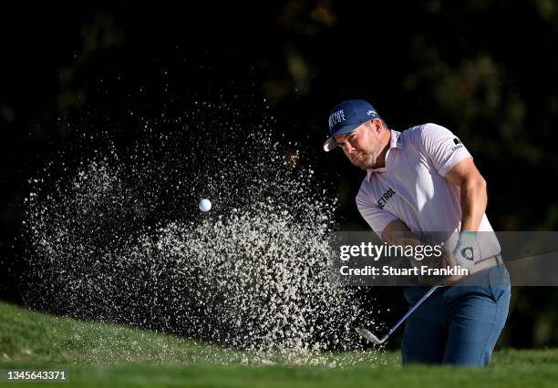 Richie Ramsay of Scotland plays his third shot on the fourth hole during Day Three of The Open de Espana at Club de Campo Villa de Madrid on October...