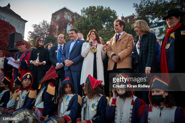 Paris Mayor and French Presidential Candidate Anne Hidalgo stands with the mayor of the 18th Arrondissement, Eric Lejoindre during the official grape...