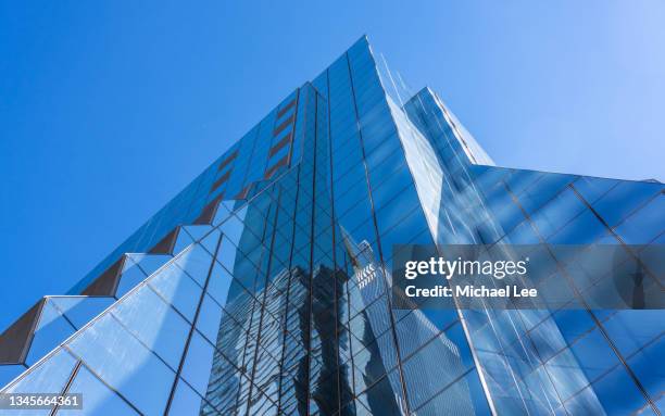 looking up at an office tower in manhattan's far west side - curtain wall facade stock pictures, royalty-free photos & images