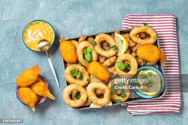 fried calamari and crab claws - cook battered fish stock pictures, royalty-free photos & images