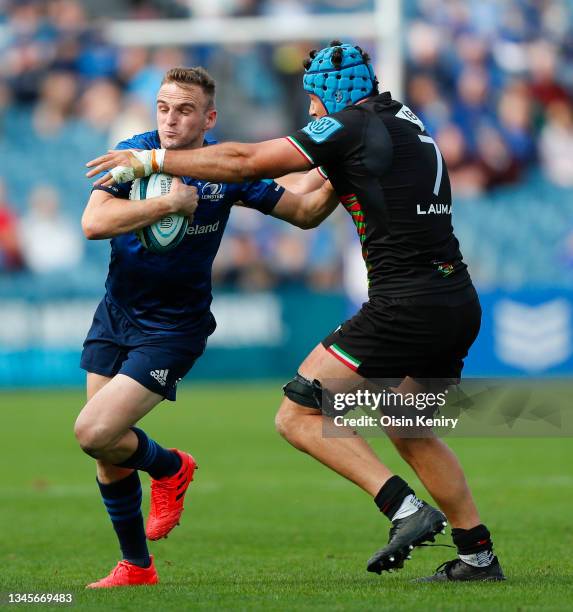 Nick McCarthy of Leinster is tackled by Luca Andreani of Zebre at RDS Arena on October 09, 2021 in Dublin, Ireland.