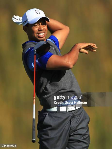Tiger Woods watches his tee shot on the fifth hole during the second round of the Chevron World Challenge at Sherwood Country Club on December 2,...