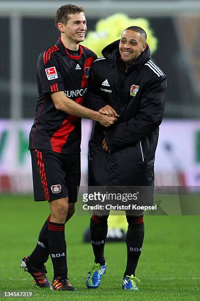 Daniel Schwaab and Sidney Sam of Leverkusen celebrate after winning 2-0 the Bundesliga match between Bayer 04 Leverkusen and 1899 Hoffenheim at...