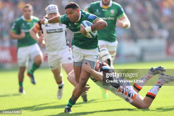 Curtis Rona of London Irish is tackled by Harry Potter of Leicester Tigers during the Gallagher Premiership Rugby match between London Irish and...