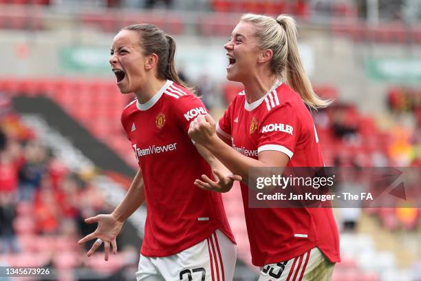 Lucy Staniforth of Manchester United celebrates with teammate Alessia Russo after scoring their team's first goal during the Barclays FA Women's...