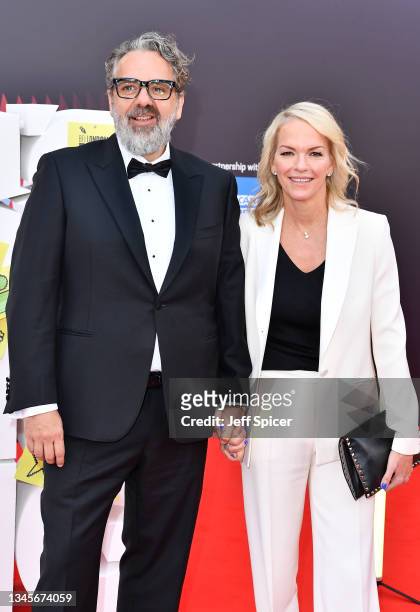 Keith Tyson and Elisabeth Murdoch attend the "Ron's Gone Wrong" World Premiere during the 65th BFI London Film Festival at The Royal Festival Hall on...