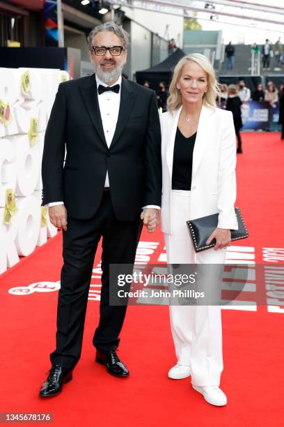 Keith Tyson and Elisabeth Murdoch attend the "Ron's Gone Wrong" World Premiere during the 65th BFI London Film Festival at The Royal Festival Hall on...