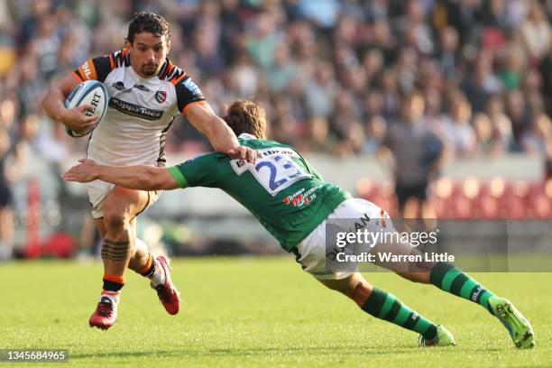 Juan Pablo Socino of Leicester Tigers is tackled by Benhard van Rensburg of London Irish during the Gallagher Premiership Rugby match between London...