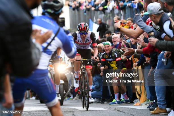 Fausto Masnada of Italy and Team Deceuninck - Quick-Step and Tadej Pogacar of Slovenia and UAE Team Emirates compete in the breakaway while fans...