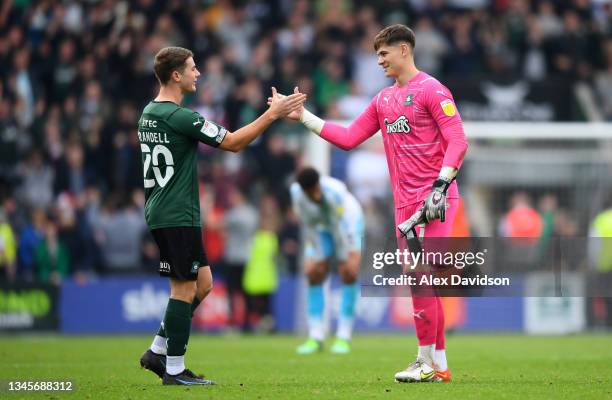 Michael Cooper and Adam Randell of Plymouth celebrate after winning the Sky Bet League One match between Plymouth Argyle and Burton Albion at Home...