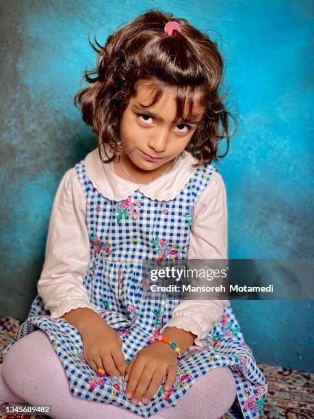 little beautiful sad girl - iranian girl fotografías e imágenes de stock