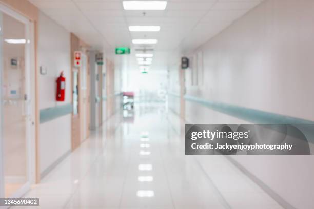 abstract blur beautiful luxury hospital interior for backgrounds - hopital couloir photos et images de collection