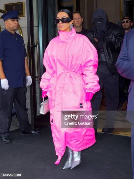 Kanye West and Kim Kardashian head out of their hotel on October 09, 2021 in New York City.