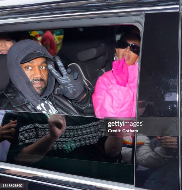 Kanye West and Kim Kardashian head out of their hotel on October 09, 2021 in New York City.