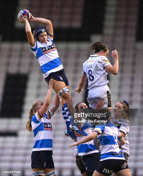 Sale player Hannah Field is beaten in the lineout by DMP player Meg Gardner during the Allianz Premier 15s between Darlington Mowden Park Sharks and...
