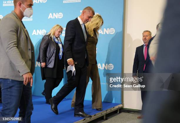 Czech Prime Minister Andrej Babis and his wife Monika depart after he spoke to the media following the loss of his ANO political movement in...