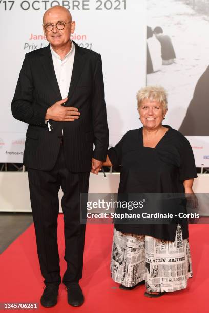 Mimie Mathy and husband Benoist Gérard attend the opening ceremony during the 13th Film Festival Lumiere In Lyon on October 09, 2021 in Lyon, France.