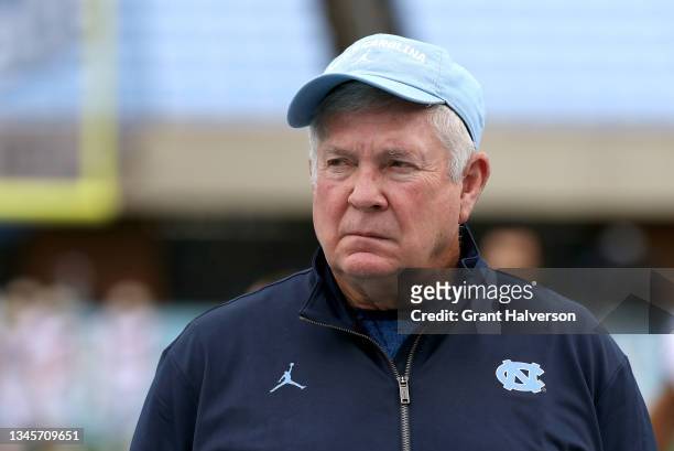 Head coach Mack Brown of the North Carolina Tar Heels watches his team warm up before their game against the Florida State Seminoles at Kenan...