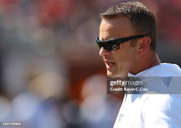 Head coach Bryan Harsin of the Auburn Tigers converses with his players during pregame warmups prior to facing the Georgia Bulldogs at Jordan-Hare...