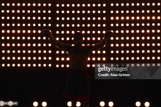 Middleweight champion Felix Sturm walks into the arena for his WBA middleweight World Championship fight against challenger Martin Murray of Great...