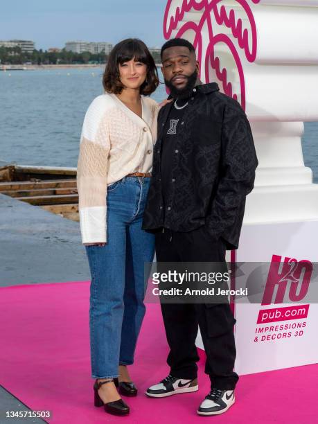 Shirine Boutella and Tayc attends the "Christmas Flow" photocall during the 4th Canneseries Festival on October 09, 2021 in Cannes, France.