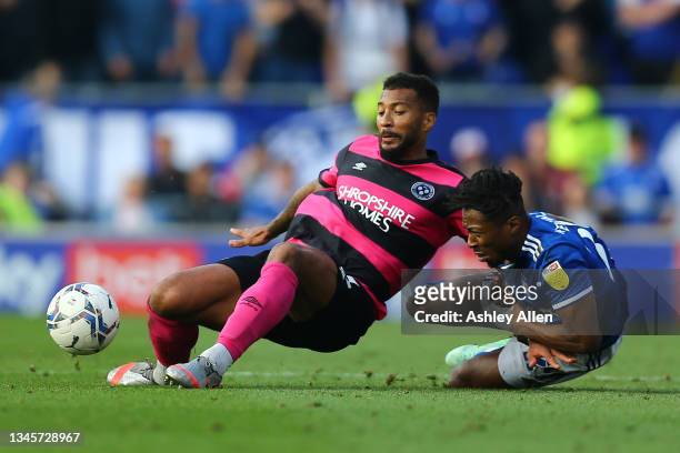 Kyle Edwards of Ipswich Town is tackled by David Davis of Shrewsbury Town during the Sky Bet League One match between Ipswich Town and Shrewsbury...