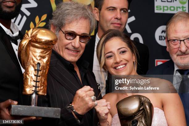 Gérard Lanvin and Manu Lanvin pose for photos with guests during the Golden Gloves Ceremony on October 09, 2021 in Brussels, Belgium.