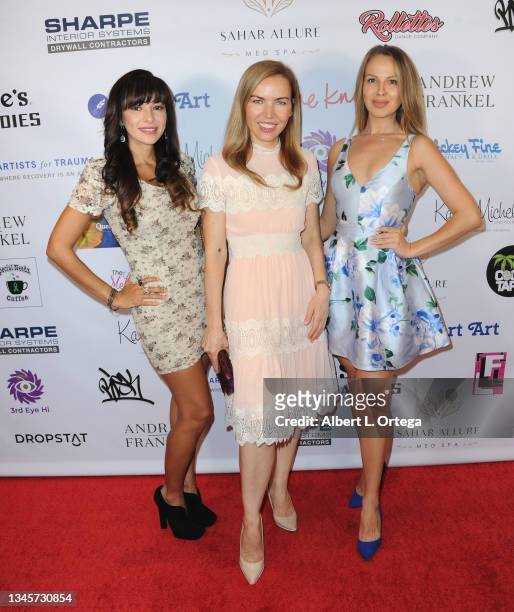 Carolina De Athey, Galina Antonova and Dessy Slava attend the Karen Michelle's "Love Your Body": Artist For Trauma Fashion Even held at Luxe Sunset...