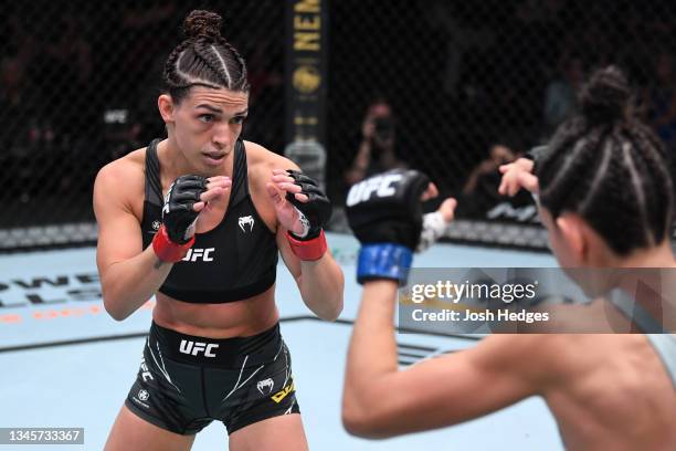 Mackenzie Dern battles Marina Rodriguez of Brazil in their women's strawweight bout during the UFC Fight Night event at UFC APEX on October 09, 2021...