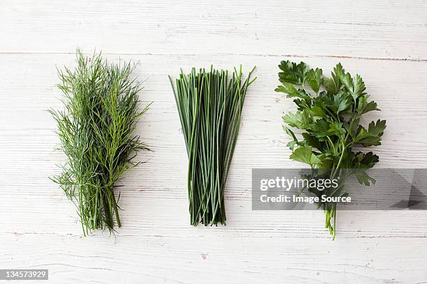 freshly cut dill, chives and flat leaf parsley - dill stock pictures, royalty-free photos & images