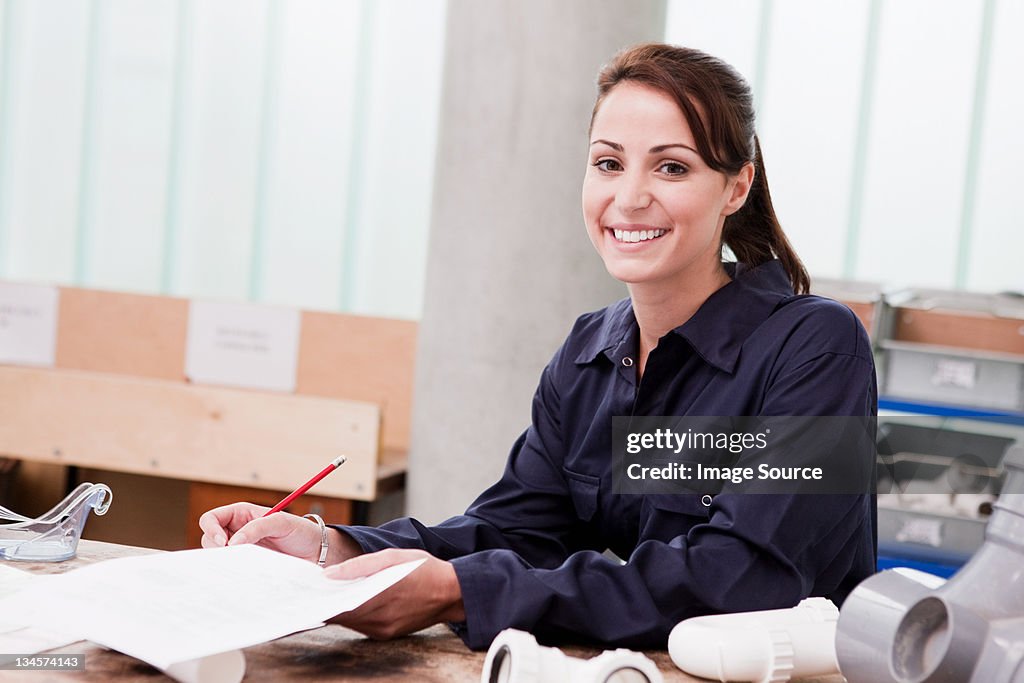 Apprentice plumber in class, portrait