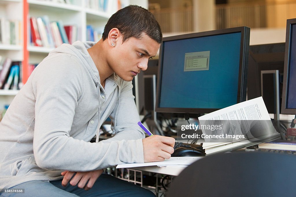 Computer Work Student University Student Working At Computer Desk High-Res Stock Photo ...
