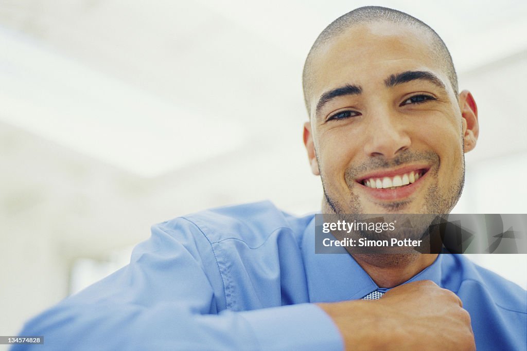 Close up of businessman's smiling face